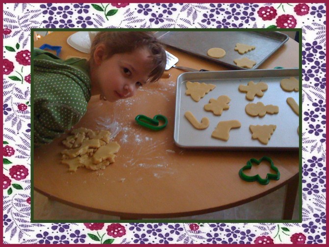 jocelyn making sugar cookie cutouts