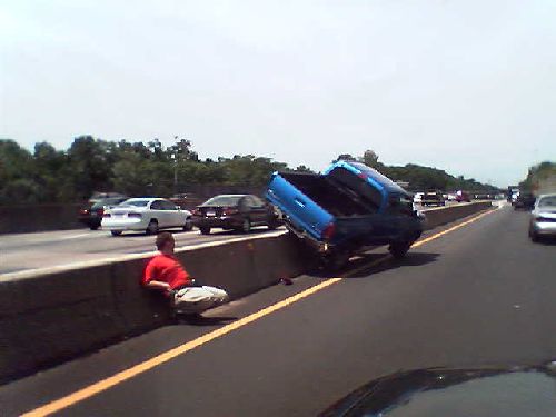 car on concrete divider median I-66 accident