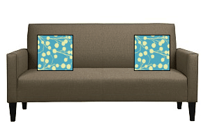couch, with mockups of pillows in joel dewberry fabric